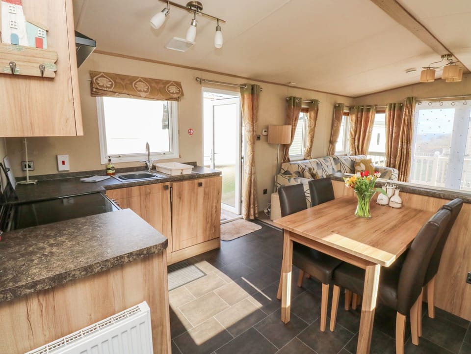 Fridge, electric kettle, toaster, cookware/dishes/utensils