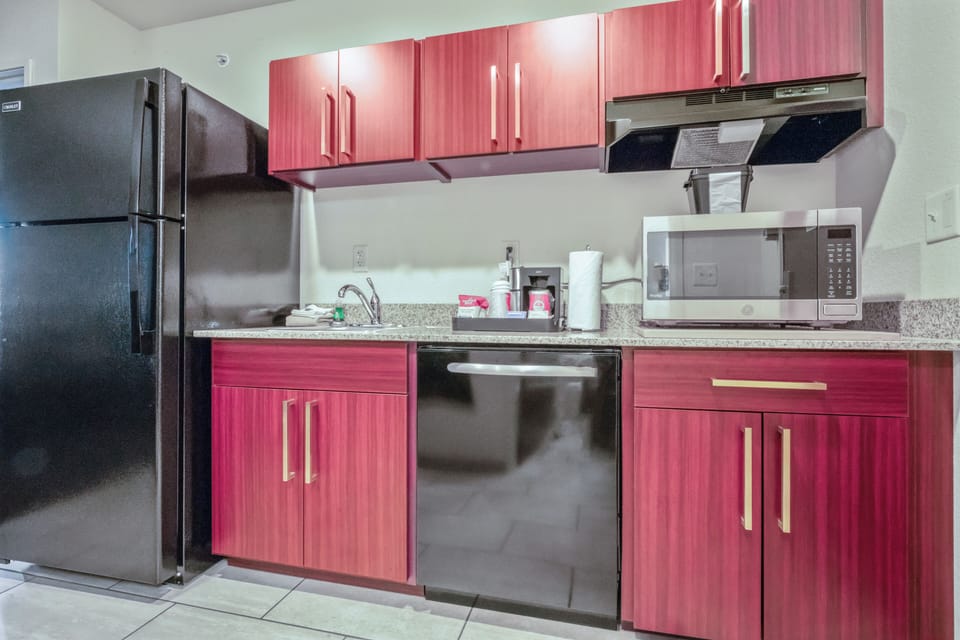 Suite, 1 King Bed with Sofa bed, Non Smoking (Extended Stay) | Private kitchenette | Mini-fridge, microwave, coffee/tea maker