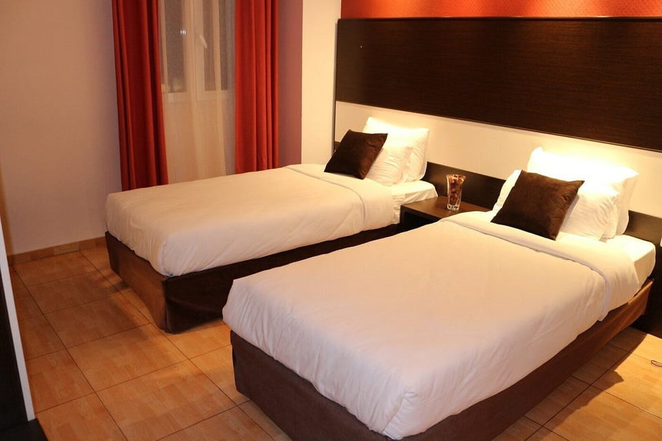 Standard Double or Twin Room, Private Bathroom | Minibar, laptop workspace, blackout drapes, WiFi (free)