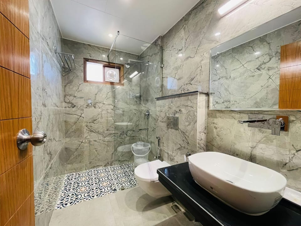 Shower, free toiletries, hair dryer, slippers