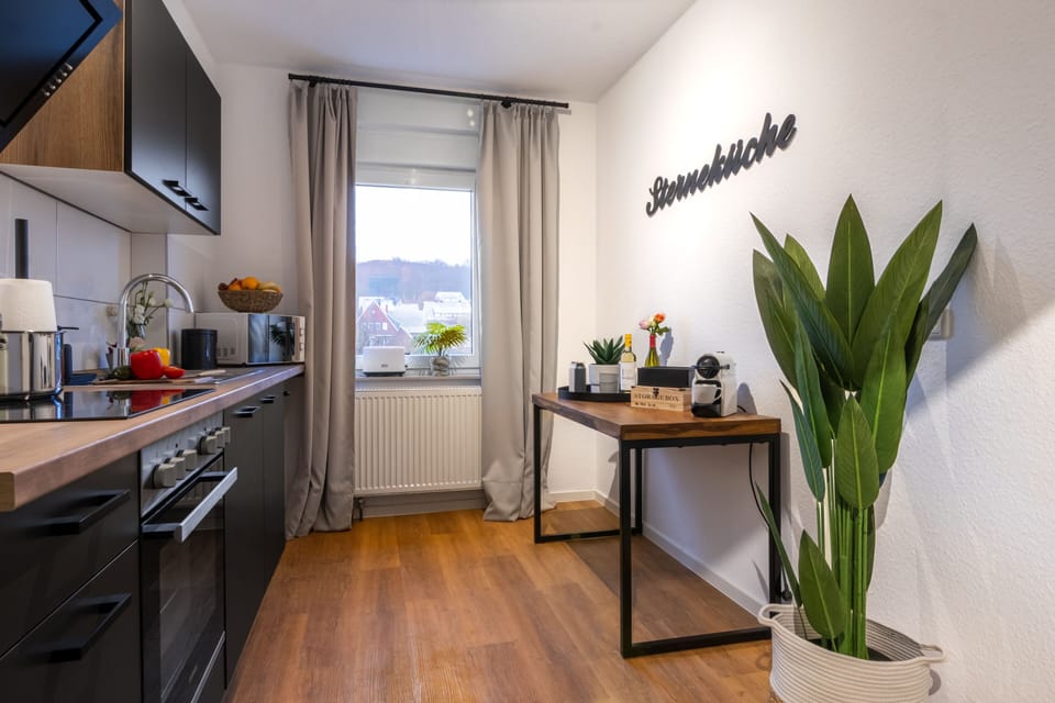 Family Apartment, 2 Bedrooms | Private kitchen | Fridge, microwave, stovetop, electric kettle