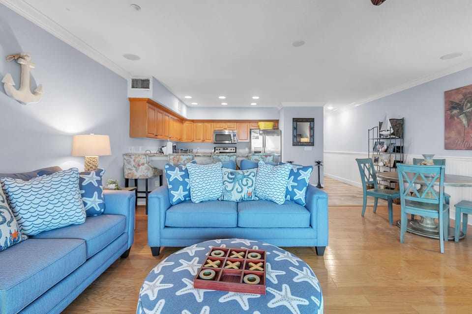 Condo, Multiple Beds (Oceanside 302) | Living area | TV