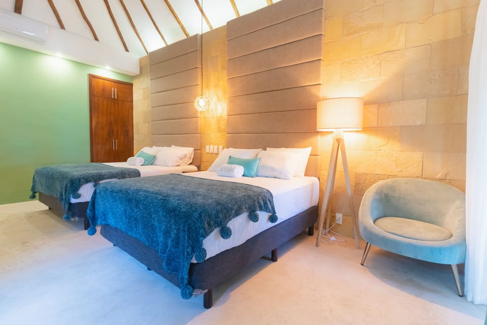 Deluxe Cabin, 2 Queen Beds, Lagoon View | 1 bedroom, down comforters, desk, laptop workspace