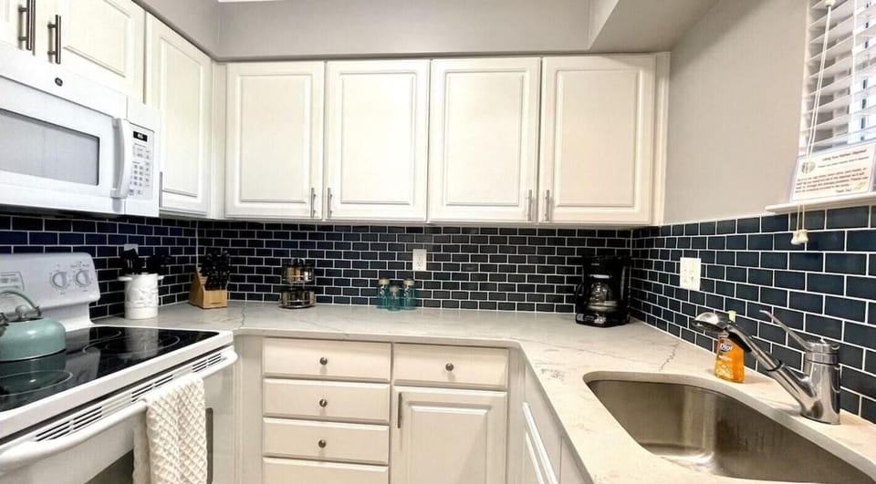 Condo, Multiple Beds (Barefoot Beach Resort A202) | Private kitchen | Oven, toaster