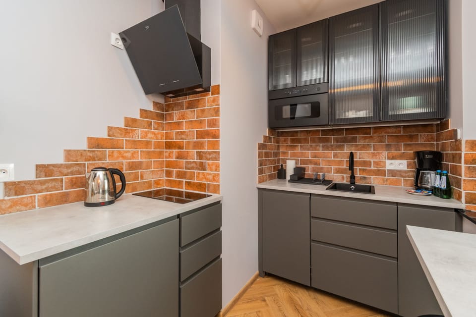 Comfort Apartment | Private kitchenette | Coffee/tea maker, electric kettle