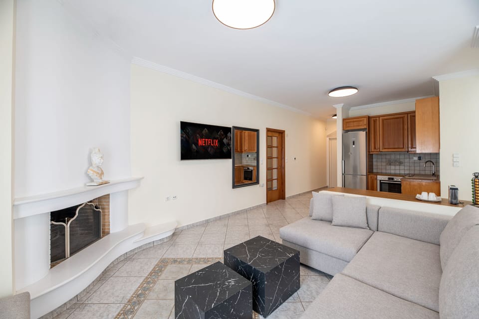 Superior Villa | Living room | 55-inch Smart TV with digital channels, fireplace, Netflix