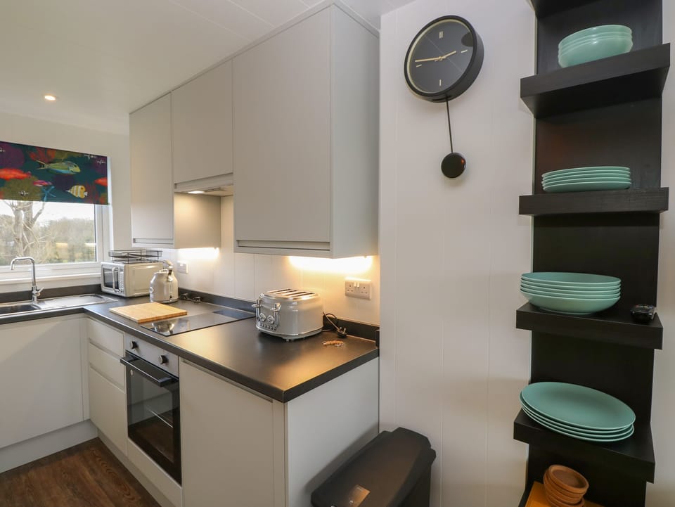 Fridge, electric kettle, toaster, cookware/dishes/utensils