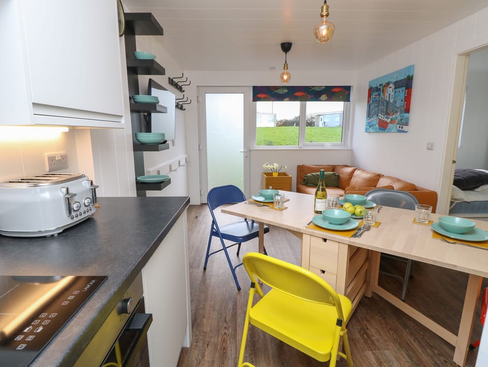 Fridge, electric kettle, toaster, cookware/dishes/utensils