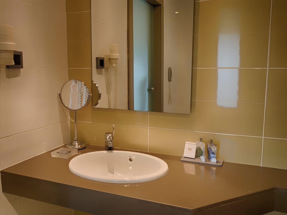 Hair dryer, bathrobes, slippers, towels