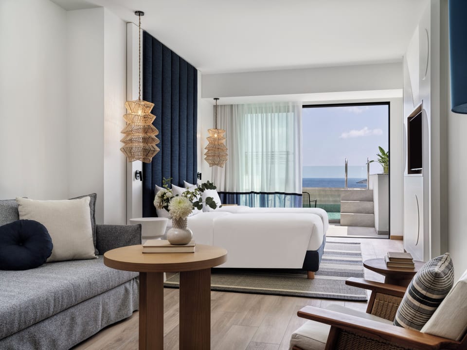 2 Twin Junior Suite Sea View Private Plunge Pool | Living area | 50-inch Smart TV with satellite channels, table tennis