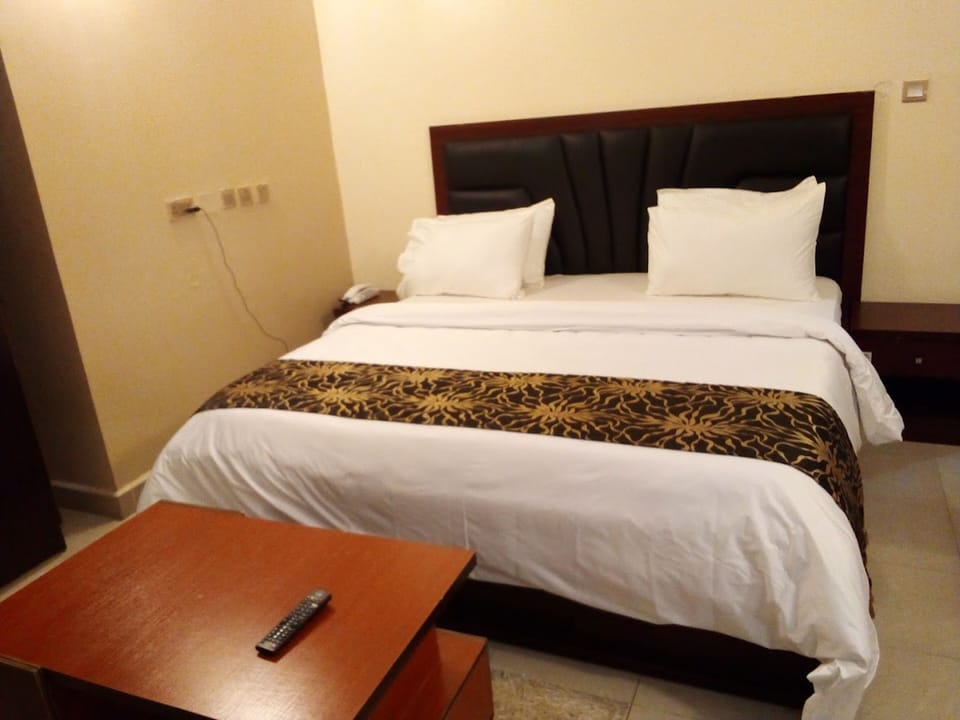 Premium bedding, memory foam beds, desk, laptop workspace
