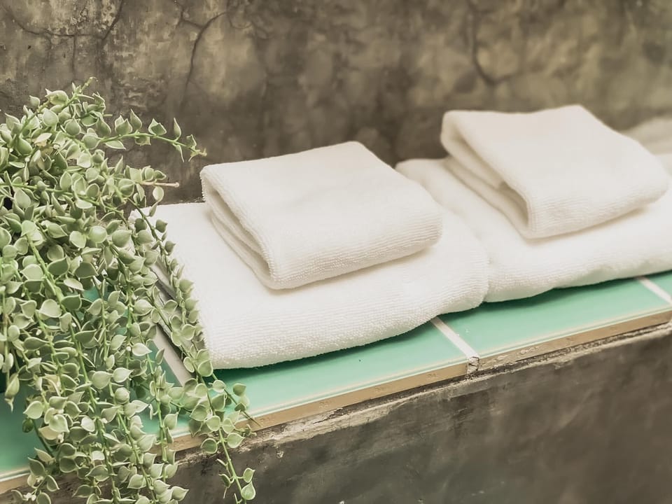 Shower, slippers, towels