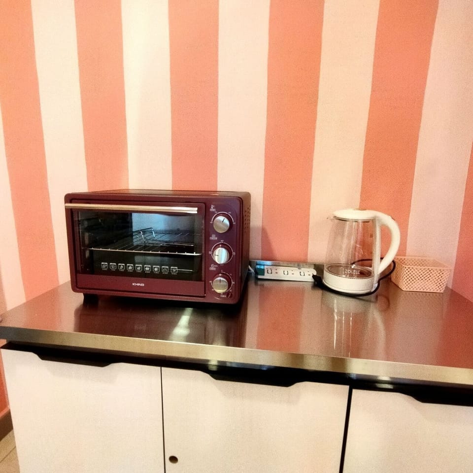 Fridge, microwave, electric kettle, cookware/dishes/utensils