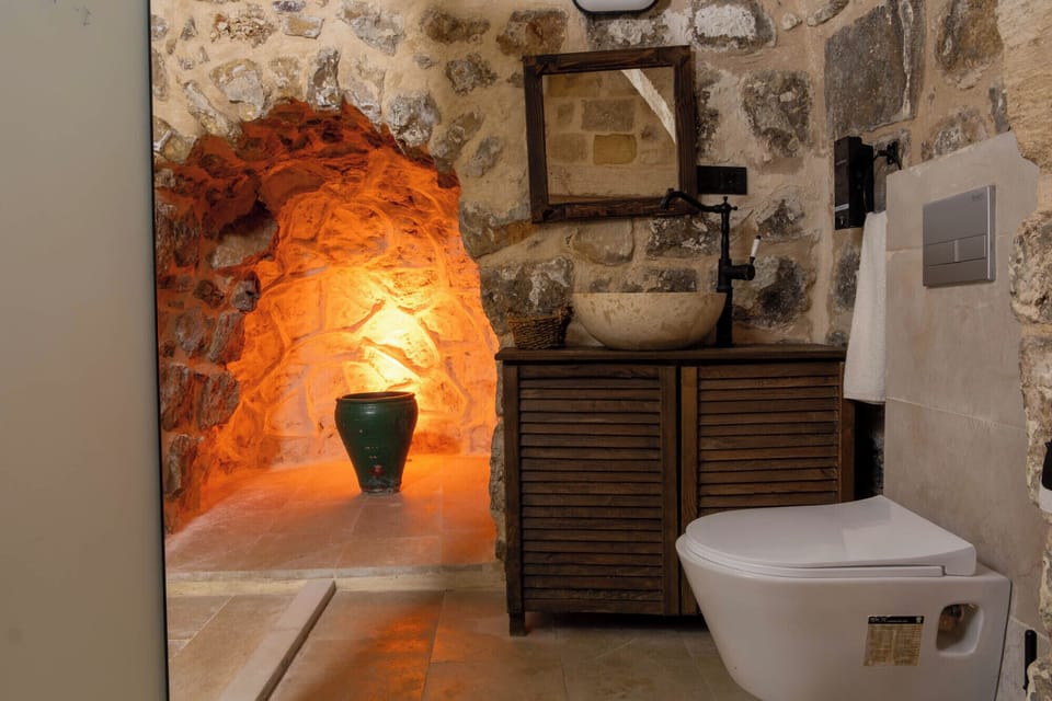 Family Suite | Bathroom | Hair dryer, slippers, towels, soap