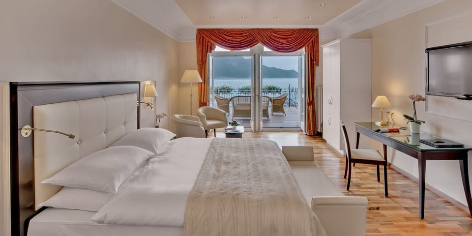 Junior Suite, 1 Queen Bed, Lake View | Premium bedding, free minibar, in-room safe, desk