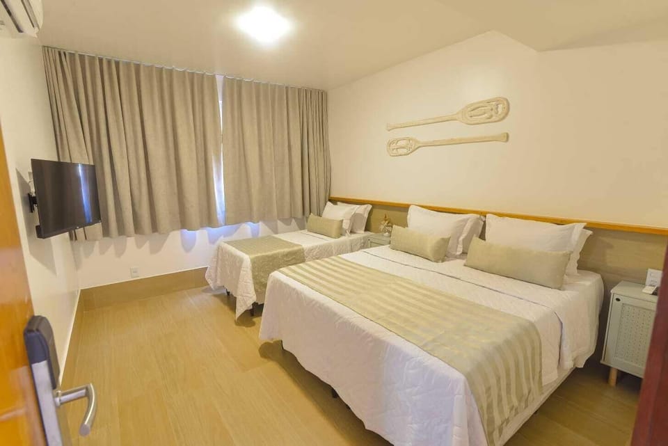 Standard Triplo | In-room safe, blackout drapes, bed sheets