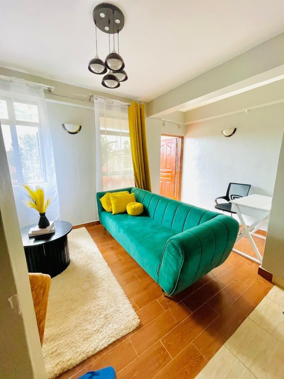 Business Apartment | Living area | 24-inch Smart TV with digital channels