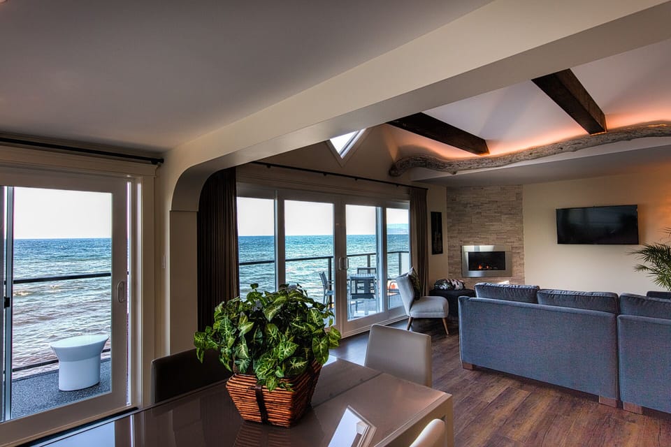 Executive Suite, 2 Bedrooms, Ocean View | Living area | 50-inch Smart TV with cable channels