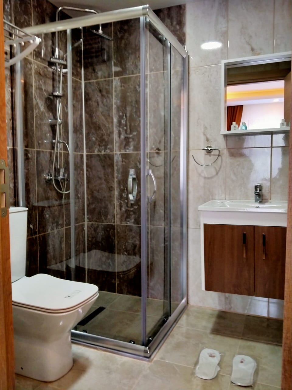 Shower, rainfall showerhead, hair dryer, slippers