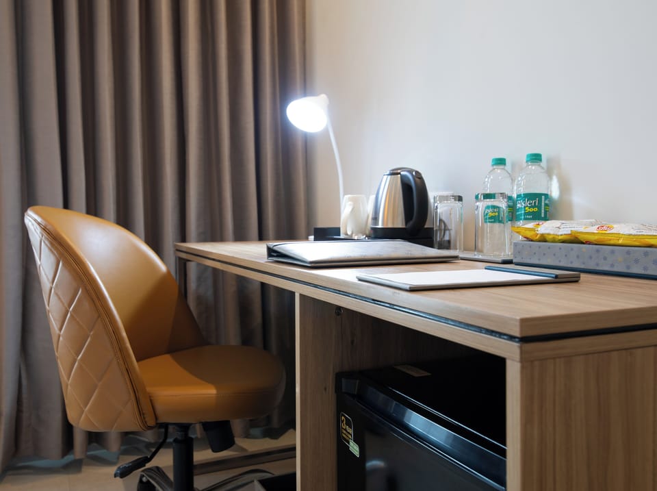 Desk, blackout drapes, soundproofing, iron/ironing board (on request)