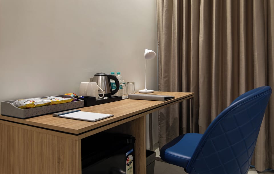 Desk, blackout drapes, soundproofing, iron/ironing board