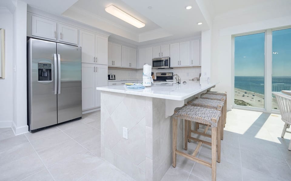 Condo, 4 Bedrooms | Private kitchen | Coffee/tea maker, fridge, oven