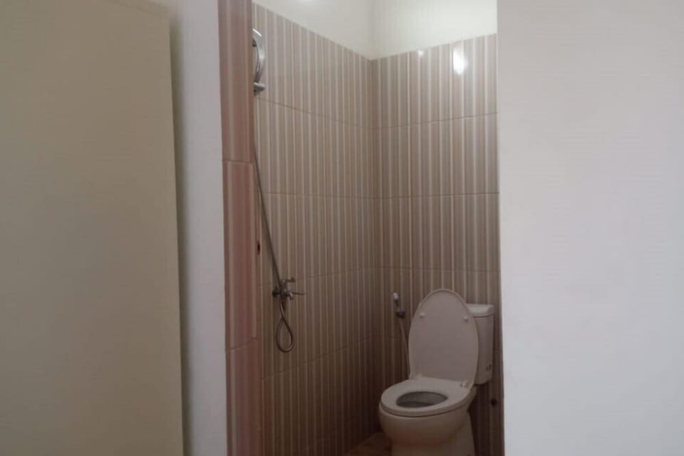 Standard Double Room | Bathroom | Shower, towels, soap