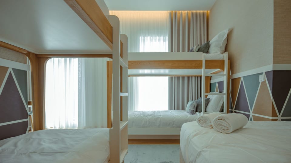Family Shared Dormitory, City View | Blackout drapes, soundproofing, free WiFi, bed sheets