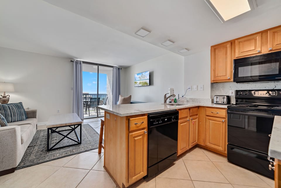 Condo, 1 Queen Bed with Sofa bed, Balcony, Ocean View (Gulf Shores Surf & Racquet Club 513A) | Private kitchen | Fridge, microwave, oven, stovetop