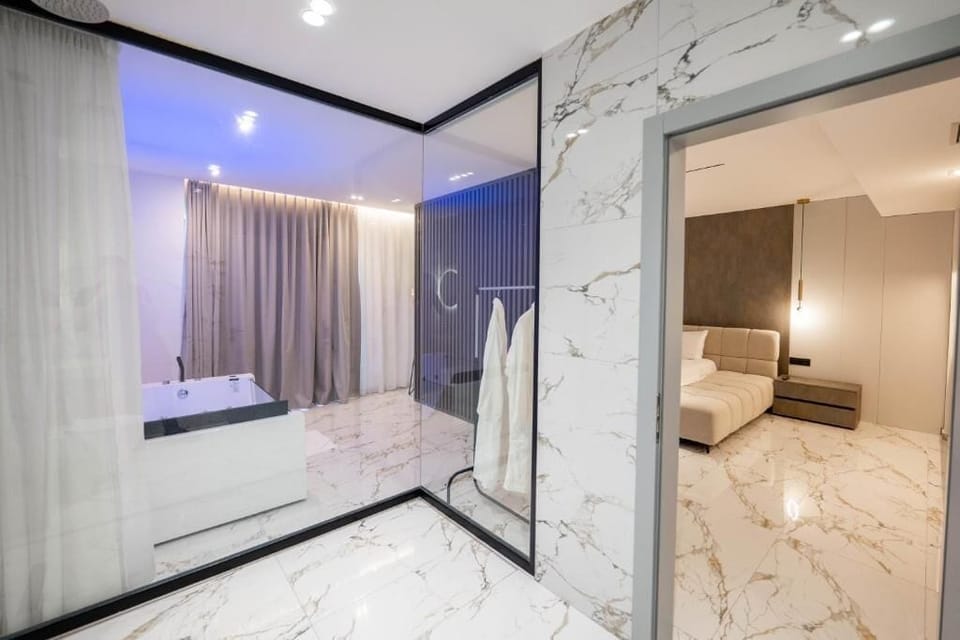 Suite, Sea View | Bathroom | Hair dryer, slippers