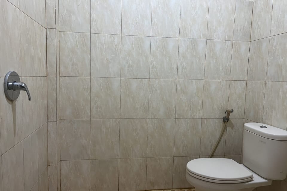 Standard Double Room | Bathroom | Shower, towels, soap