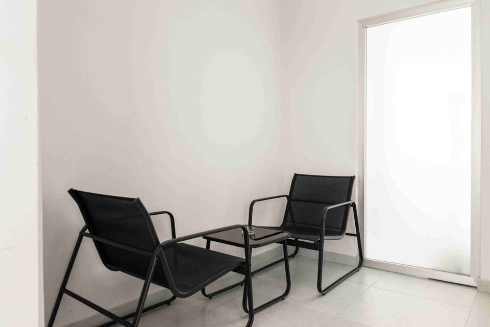 Luxury Suite, Sea View | 1 bedroom, in-room safe, blackout drapes, iron/ironing board