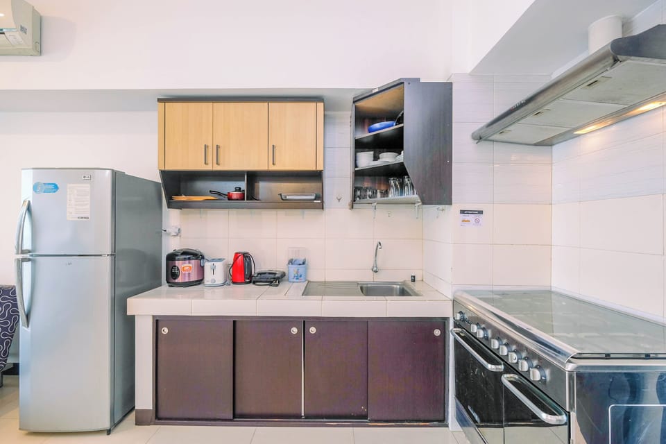 Apartment | Private kitchen | Fridge, stovetop, rice cooker, dining tables