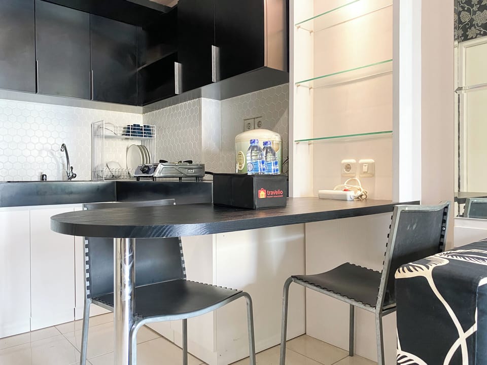 Apartment | Private kitchen | Full-size fridge, stovetop, electric kettle, cookware/dishes/utensils