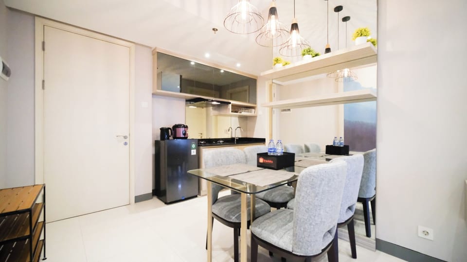 Apartment | Private kitchen | Full-size fridge, stovetop, electric kettle, cookware/dishes/utensils