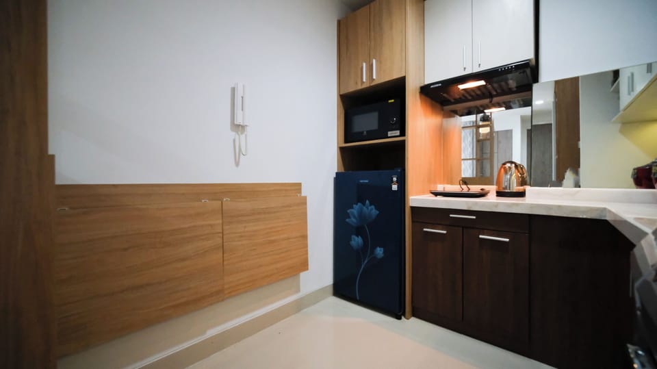 Apartment | Private kitchen | Full-size fridge, stovetop