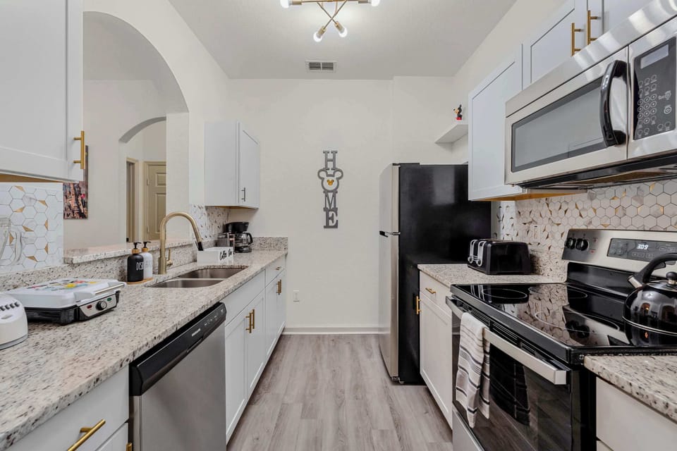 Condo, Multiple Beds, Balcony, Garden View (Playful Paradise At Windsor Hills) | Private kitchen | Fridge, microwave, oven, stovetop