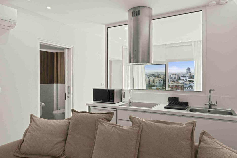 Luxury Suite | 1 bedroom, in-room safe, blackout drapes, iron/ironing board