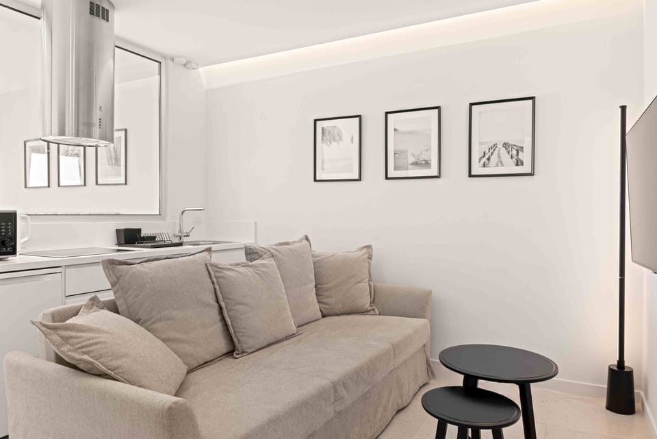Luxury Suite | 1 bedroom, in-room safe, blackout drapes, iron/ironing board