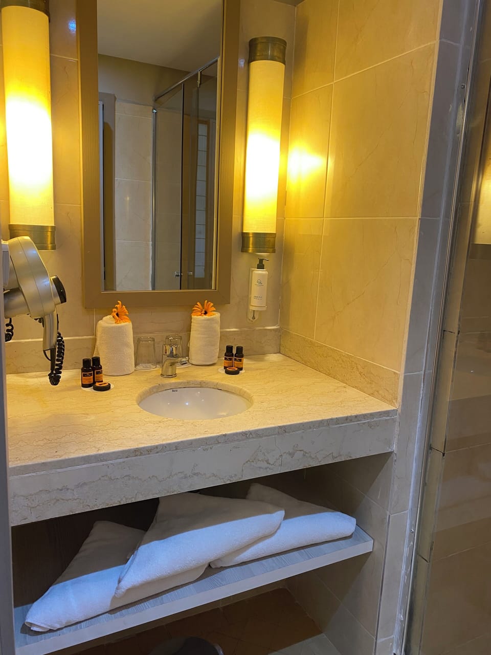 Shower, free toiletries, hair dryer, towels