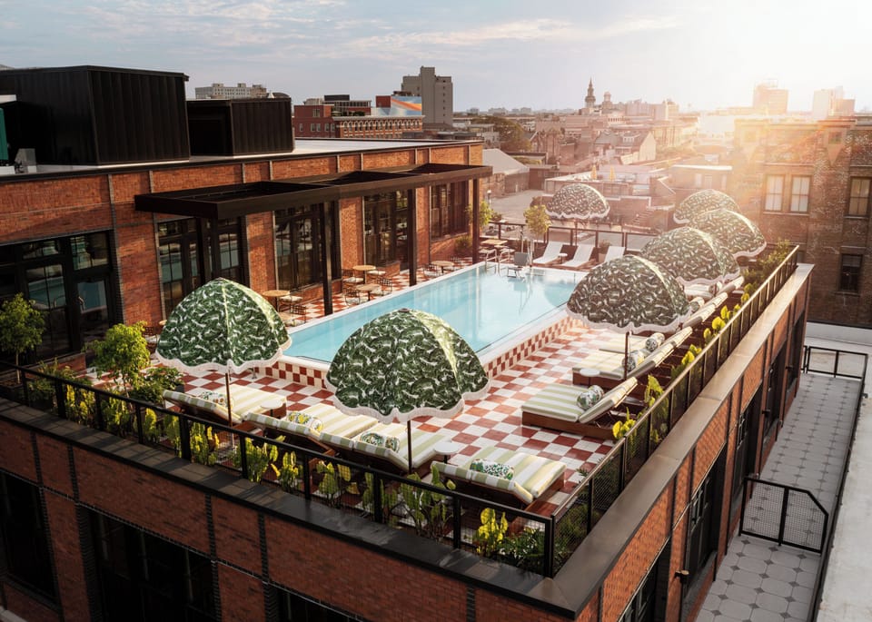 Outdoor pool, open 8:00 AM to 10:00 PM, pool umbrellas, sun loungers