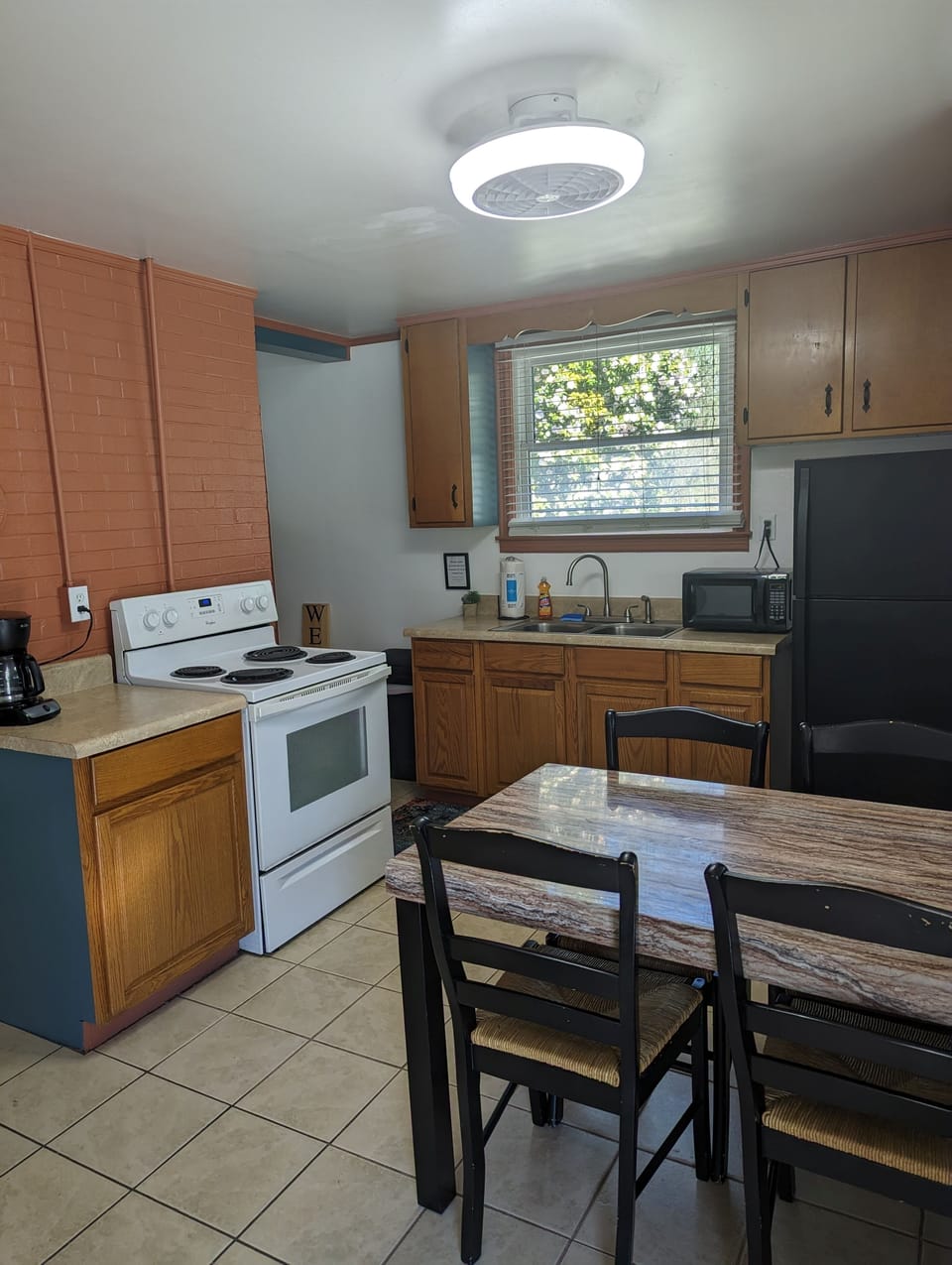 Cottage at Anvil Campground | Private kitchen | Fridge, microwave