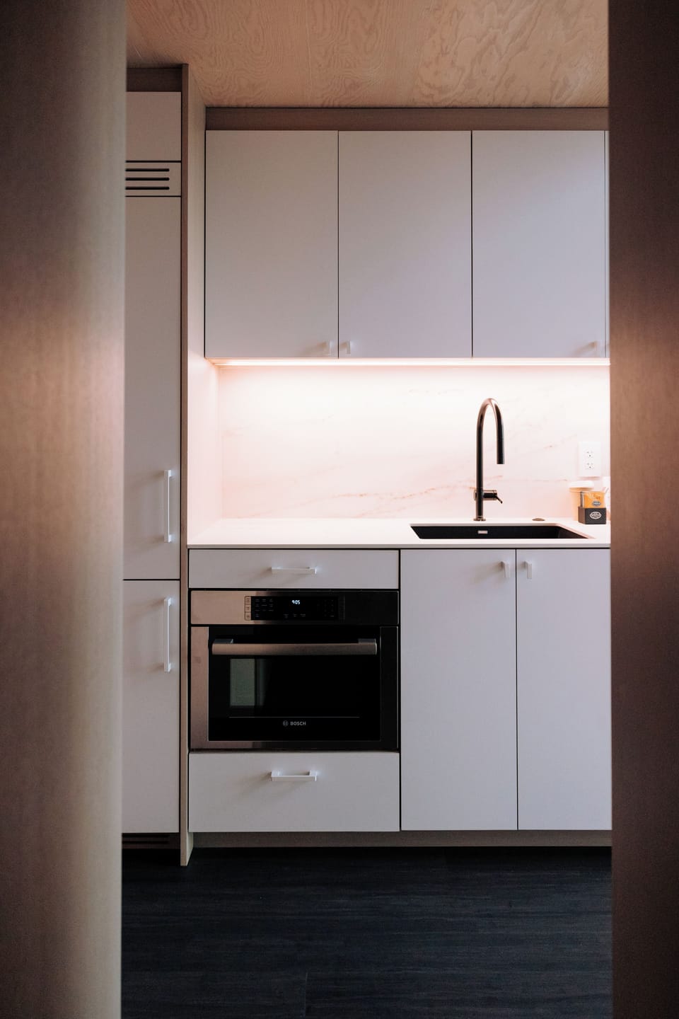 Fridge, stovetop, dishwasher, coffee/tea maker