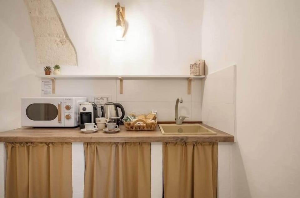 Full-size fridge, microwave, stovetop, espresso maker