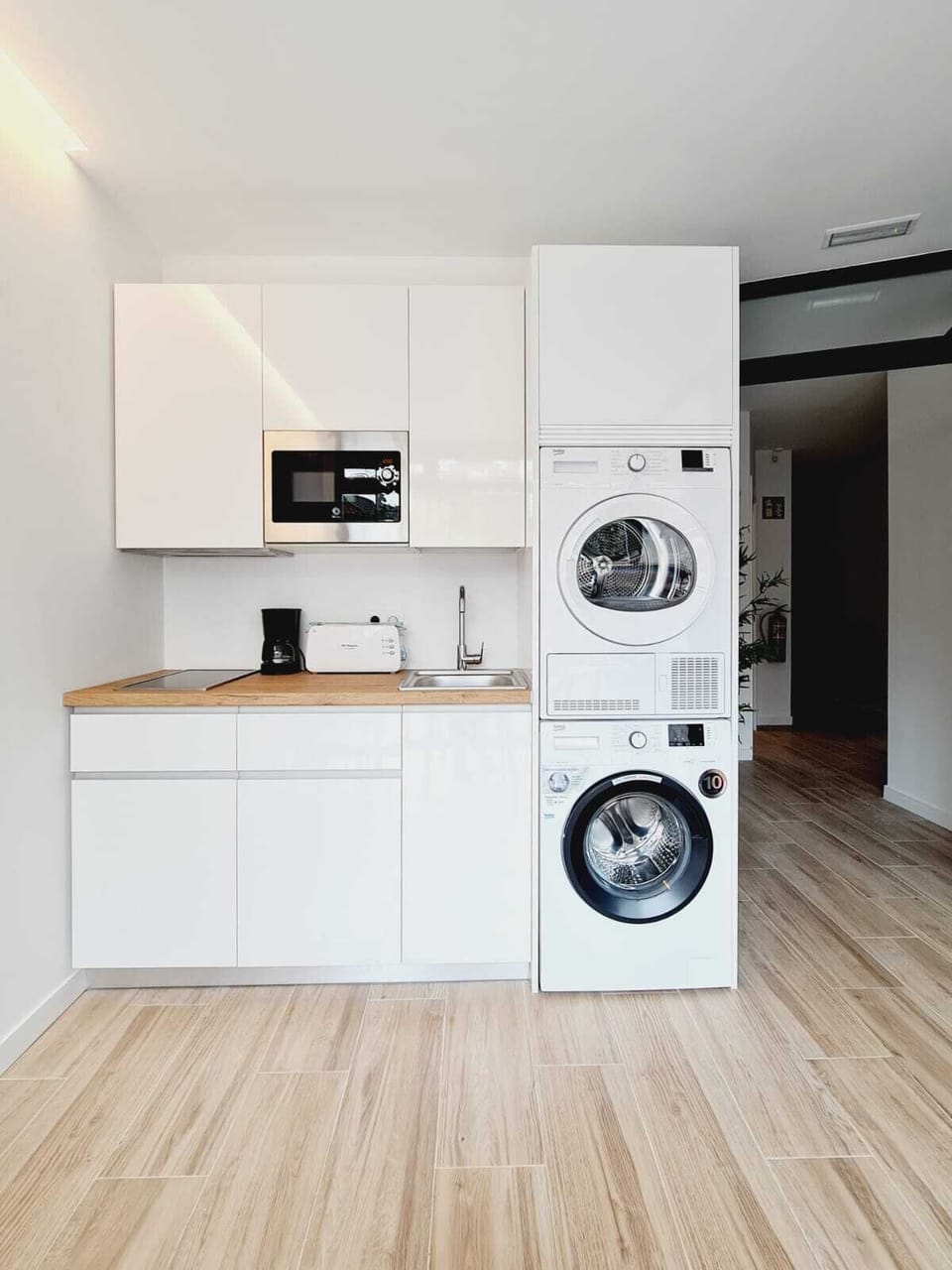 Mini-fridge, microwave, stovetop, coffee/tea maker