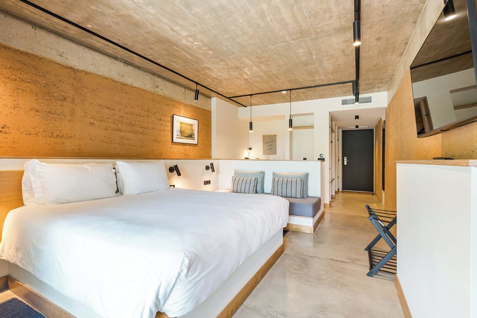 Deluxe Double Room, Multiple Bedrooms | Premium bedding, down comforters, in-room safe, individually decorated