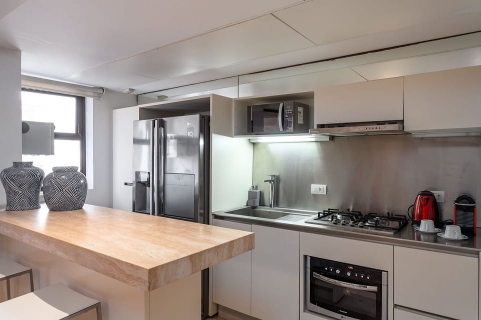Apartment | Private kitchen | Full-size fridge, cookware/dishes/utensils