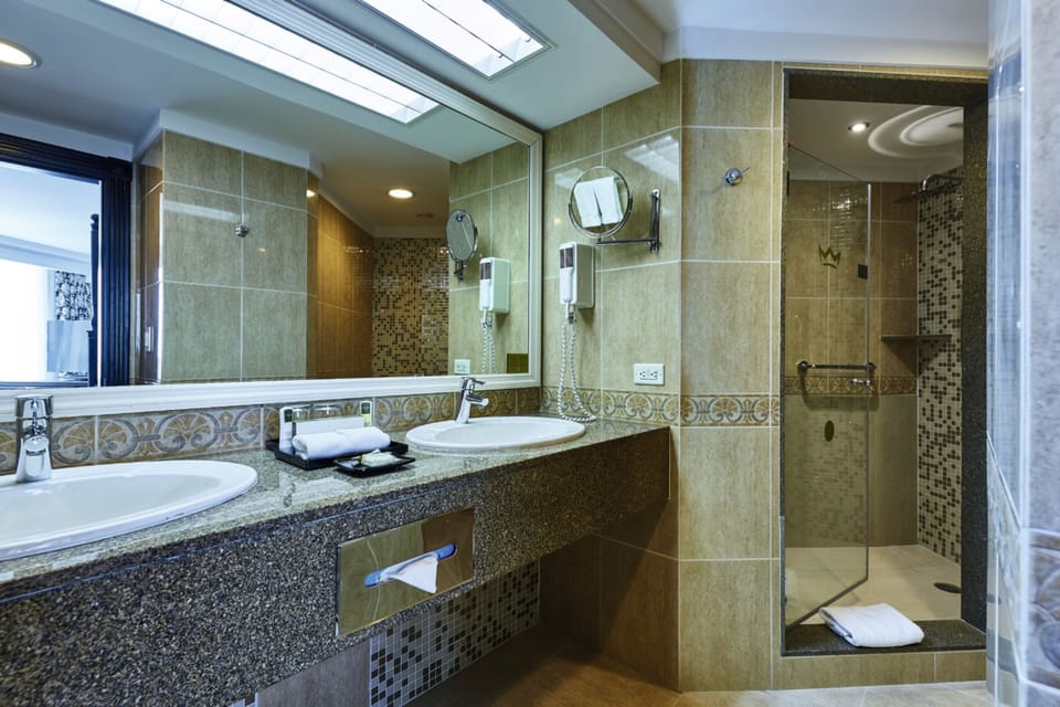 Eco-friendly toiletries, hair dryer, bathrobes, towels