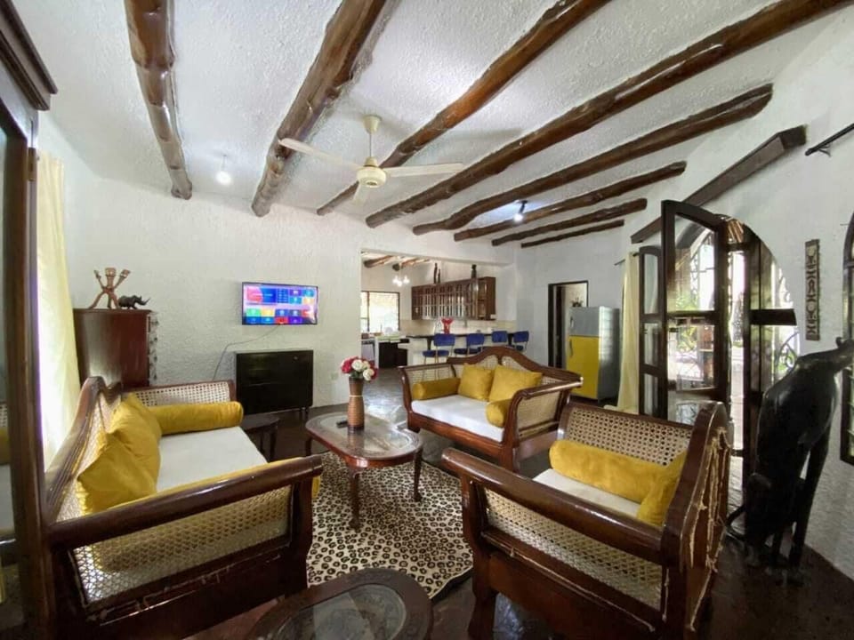 Comfort Villa | Living area | 24-inch Smart TV with digital channels