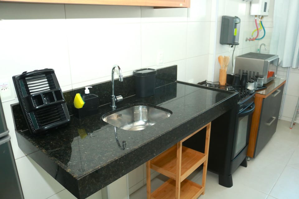 Fridge, microwave, blender, cookware/dishes/utensils